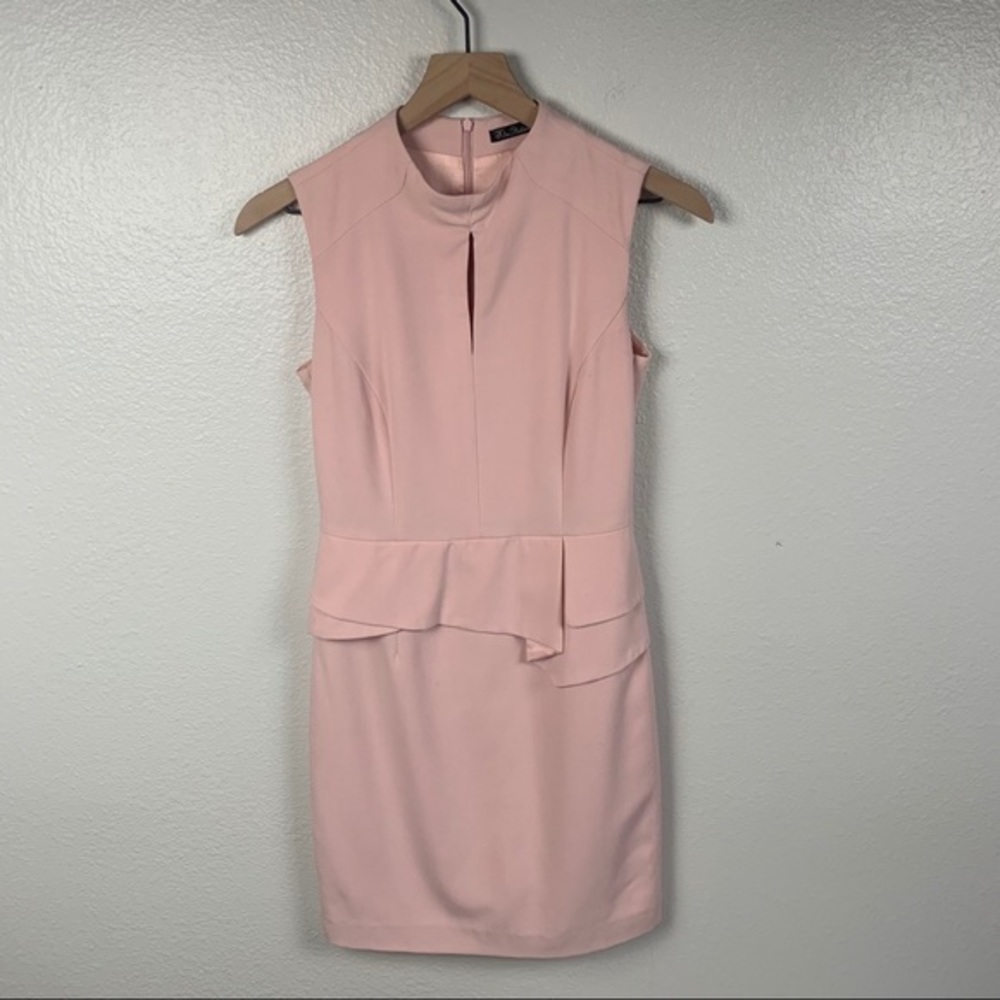 Pale pink dress with a peplum waste